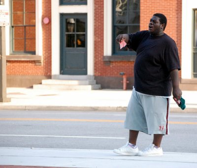 James Williams sells tickets outside Oriole Park at Camden Yards before a July game against the Minnesota Twins. (Photo: Steve Kilar)