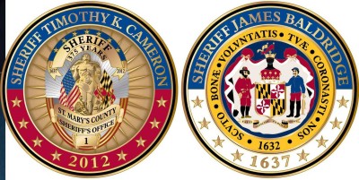 Front and reverse sides of a commemorative coin celebrating the 375th anniversary of the Sheriff's Office. Coins are for sale for $15 each.