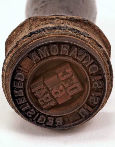 This handstamp was used last on December 6, 1941, aboard the USS Oklahoma, one of eight battleships at Pearl Harbor the day before the Japanese bombed the harbor. It was recovered from the sunken ship. (Photo: Smithsonian)