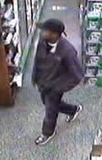 This man is wanted for stealing cash from Corner Liquors in Lexington Park on Nov. 7. (Store surveillance photo)