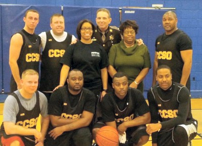 The CCSO basketball team. Front row: CPL R. Taylor, PFC P. Mann, PFC D. Harrison, and COI A. Edwards. Back row: POII P. Morgan III, PFC M. Sokoloff, CFC J. Minor, Sheriff Rex Coffey, Gloria Minor, and PFC J. Thompson. (Submitted photo)