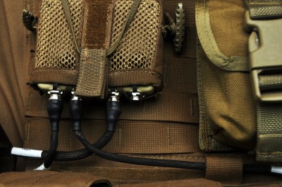 The Marine Austere Patrolling System's (MAPS) vest power manager (VPM-402) connects and manages multiple, tactical power requirements through a single interface. MAPS is a technology being developed at the Naval Surface Warfare Center Dahlgren Division for the Marine Expeditionary Energy Office. The system improves the sustainability of dismounted Marines on patrol by providing them with a central energy source, a wearable solar panel and a water filtration system. (U.S. Navy photo by Elliott Fabrizio/Released)