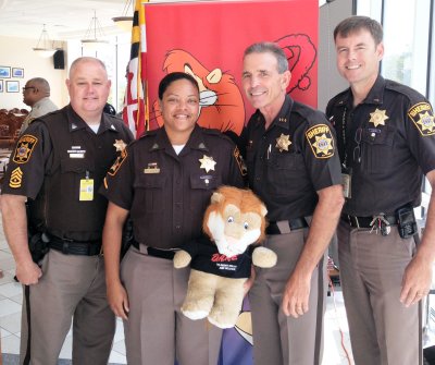 Amy Upshaw's DARE graduation, pictured with Sgt. Rye, Sheriff Coffey and Lt. Salvas. (Photo: CCSO)