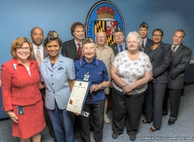 Pictured with Charles County Commissioners: Ms. Joan Sabree, Commander of Disabled American Veterans (holding proclamation); and Disabled American Veterans representatives. (Photo: Charles Co. Government)