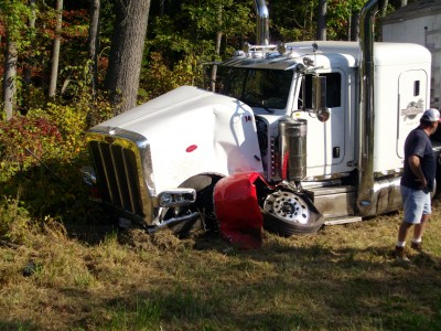Police say the Jeep Liberty drove into the path of the pictured tractor trailer, causing severe damage to both vehicles. Police say the Jeep driver, Karen Ann Yarbrough Boyce, 39 of Barstow, has a charge pending against her for driving while under the influence of alcohol and/or drugs pending toxicology results. (Photos courtesy of Calvert Co. Sheriff's Office)