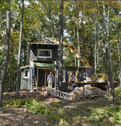 Making the install of the hob more difficult is Blue Moon Rising's rule that no trees be disturbed in the installation process. Trees are only removed to fit hobs as a last resort and, if removed, are worked into the design of the cabin. (Photo: Kate Andries)