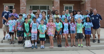 Sheriff Rex Coffey, members of the CCSO School Resource Unit and students in the Just Say No program celebrate the end of the 2013 Just Say No Summer Camp.