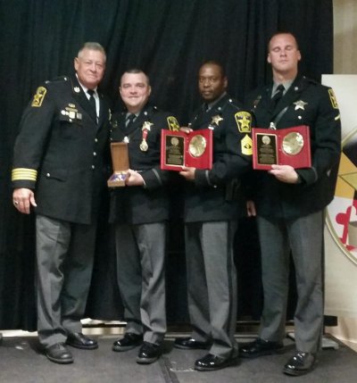 Sgt. Ricky Cox was presented the award for Valor, F/Sgt. Keith Hicks for Community Service and DFC Nick DeFelice for Contribution to Profession.