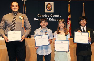 Pictured from left are Ricardo Cardoza, Westlake High School senior; Jacob Gallagher, Indian Head Elementary School fifth grader; Danielle Monopoli, Mt. Hope/Nanjemoy Elementary School fifth grader; and John Canonizado, Theodore G. Davis Middle School eighth grader. The Board honors students monthly.