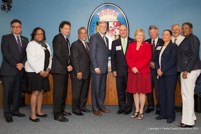 The Charles County Commissioners, joined Maryland Department of Business and Economic Development. (l. to r.): Michael Mallinoff, Charles County Government; Rhonda Ray, DBED; Commissioner Vice President Ken Robinson (District 1); Commissioner Bobby Rucci (District 4); Commissioner President Peter F. Murphy ; Secretary Mike Gill, DBED; Del. Sally Jameson, House of Delegates; Mayor Roy Hale, Town of La Plata; Marcia Keeth, Charles County Government; Steve Wall, DBED; Commissioner Debra M. Davis, Esq. (District 2).