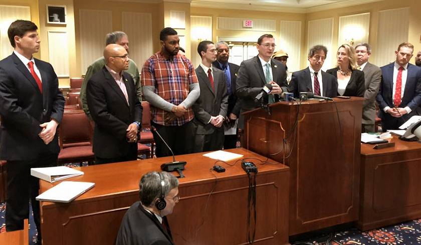 Sen. Michael Hough, center at podium, with Sen. Jamie Raskin and others discuss new comprehensive proposal on seizing assets. (Photo: Michael Hough's Facebook page)