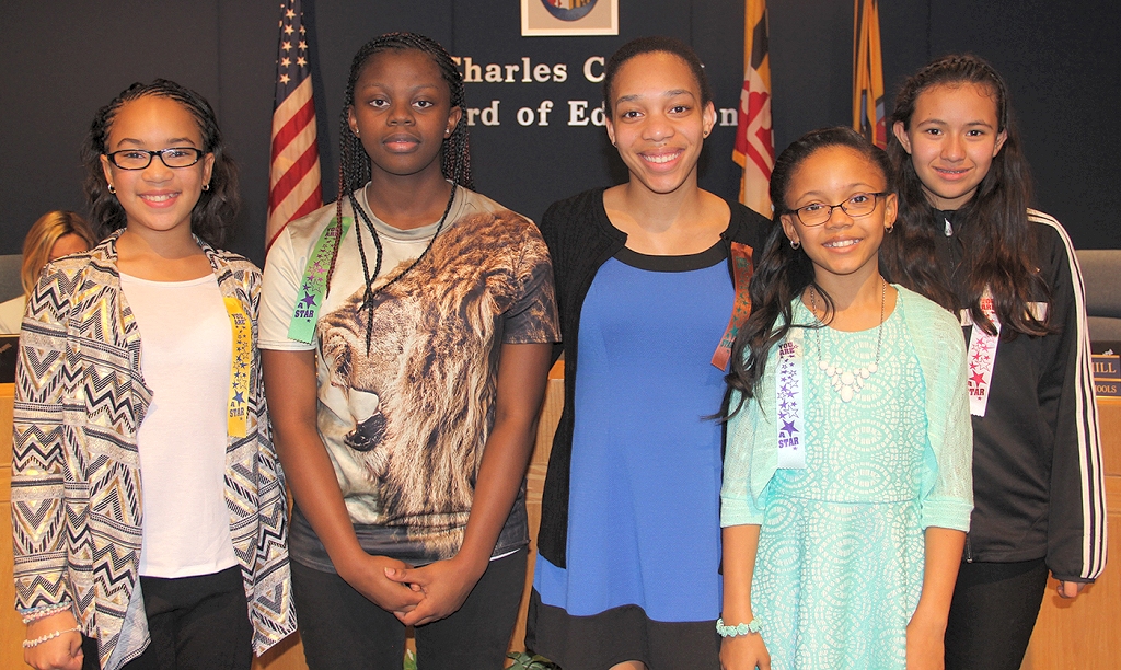 Pictured, from left, are Kiara Thomas, J.P. Ryon Elementary School fifth grader, Kierra Brevard, General Smallwood Middle School eighth grader, Thomas Stone High School sophomore Jenesis Andrews-Kendale, William A. Diggs Elementary School fifth grader Olivia McNeil and Dr. Samuel A. Mudd Elementary School fifth grader Erika Urrego.