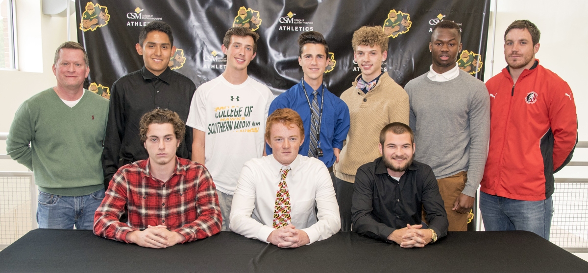 Head Coach Tom Pollert, back row left, and Assistant Head Coach Simon French, back row right, join eight of the 11 players signed to the 2016 Men's Soccer team, including, seated from left, Andrew Knight of Mechanicsville, Jackson Meadows of La Plata and Paul Burton of Pomfret; and back row from left, Miguel Navarro of St. Leonard, Bradley Reiber of White Plains, Max Bode of Nanjemoy, Branden Herscher of Waldorf and Djibril Mbaye of Accokeek.
