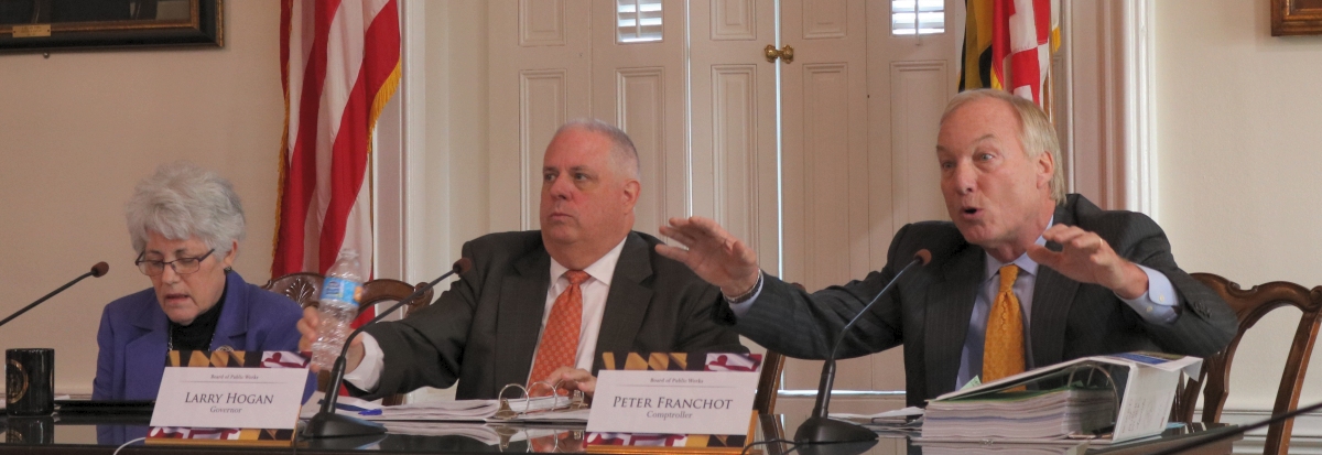 The Board of Public Works members Treasurer Nancy Kopp, Gov. Larry Hogan and Comptroller Peter Franchot discuss Maryland's cuts in spending for the 2017 fiscal year on Wednesday, Nov. 2, 2016. (Photo: Vickie Connor)