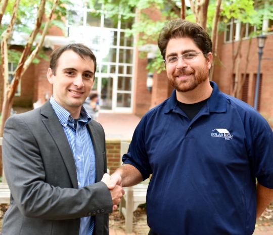 Troy Townsend, assistant professor of chemistry at St. Mary's College of Maryland, left, and Jeff Croisetiere, '04 SMCM alumnus and project manager for Solar Tech Inc. are working together to develop a proof-of-concept process to print low-cost and lightweight solar modules. (Photo: SMCM)