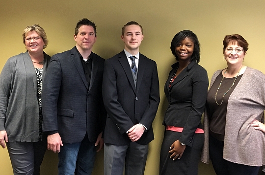 From left, Bay Business Group Vice President Diane Burr and member Brian McDaniel stand with CSM students Josh Griffith and Cayla Chase, next to Bay Business Group Secretary Karen Kroll after Griffith and Chase are announced as the first recipients of the newly established Bay Business Group Annual Scholarship.