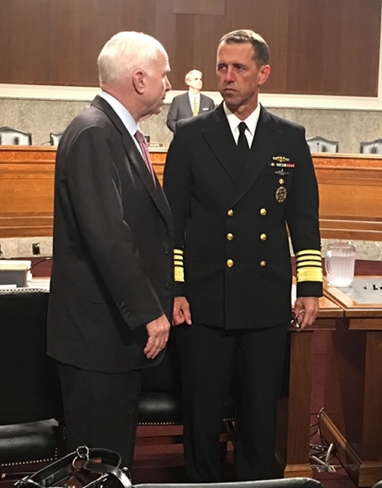 WASHINGTON --- Arizona Sen. John McCain and Navy Admiral John Richardson, chief of naval operations, spoke briefly following Tuesday's hearing before the Senate Armed Services Committee. (Photo by Connor Hoyt)
