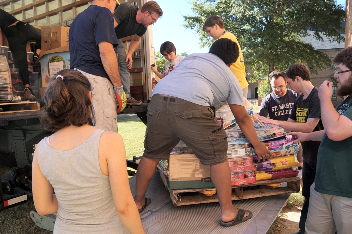 St. Mary's College students and staff loading the truck. (Photo courtesy of SMCM)