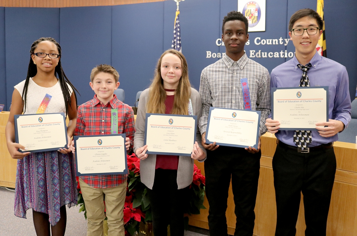 The Board of Education at its Dec. 12 meeting honored five Charles County Public Schools (CCPS) students for their accomplishments in academic achievement, personal responsibility and career readiness. They were, from left, Joya Thompson, fifth-grade student, Arthur Middleton Elementary School; Clinton Cupples, fifth-grade student, Mary H. Matula Elementary School; Lucy Flynn, fifth-grade student, Gale-Bailey Elementary School; Diallo Barnes, eighth-grade student, Milton M. Somers Middle School; and Charlie Shin, senior, Maurice J. McDonough High School.