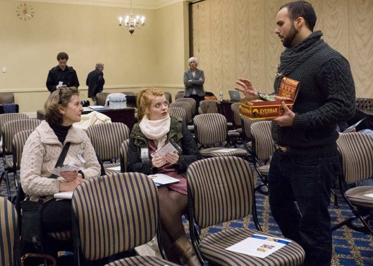 Alex Hempfield, who changed his last name from Joseph, shares his hemp nutritional bars with forum attendees at an Abell Foundation Hemp forum on Friday, Feb. 2, 2018 in Annapolis, Md. Hempfield started his own hemp product business in 2011, specifically known for his nutritional bar called 'Everbar.' (Photo: Layne Litsinger)