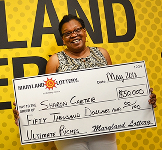 Sharon Carter had an "OMG moment" courtesy of a $50,000 win on an Ultimate Riches scratch-off.
