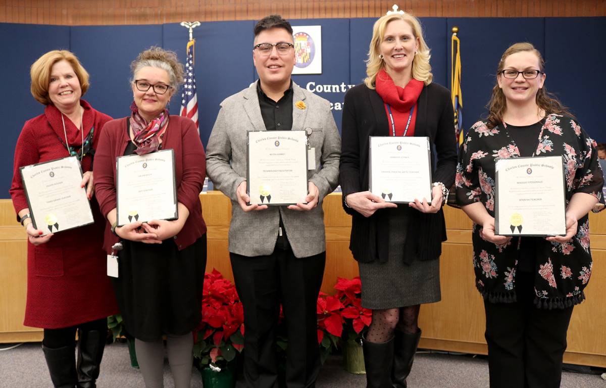 The Board of Education at its Dec. 11 meeting honored five Charles County Public Schools (CCPS) staff members for their dedication to children, and commitment to teaching and learning. Honored, from left, were Eileen Holden, third-grade teacher at Berry Elementary School; Laura Kelly, art teacher at Dr. Thomas L. Higdon Elementary School; Keith Juarez, technology facilitator at Eva Turner Elementary School; Jennifer Joyner, drama teacher at La Plata High School; and Maggie Fitzgerald, Spanish teacher at Piccowaxen Middle School.