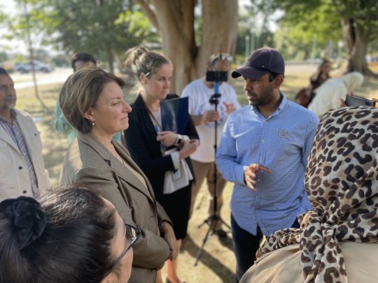 WASHINGTON - Sen. Amy Klobuchar, D-Minnesota, meets with a group of supporters holding a "firewatch" outside the United States Capitol in support of the Afghan Adjustment Act. (Eve Sampson)