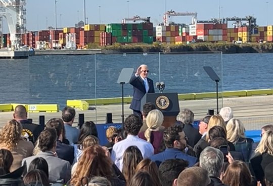 President Biden waves to the crowd at Dundalk Marine Terminal before his remarks. (Jack Bowman, CNS)